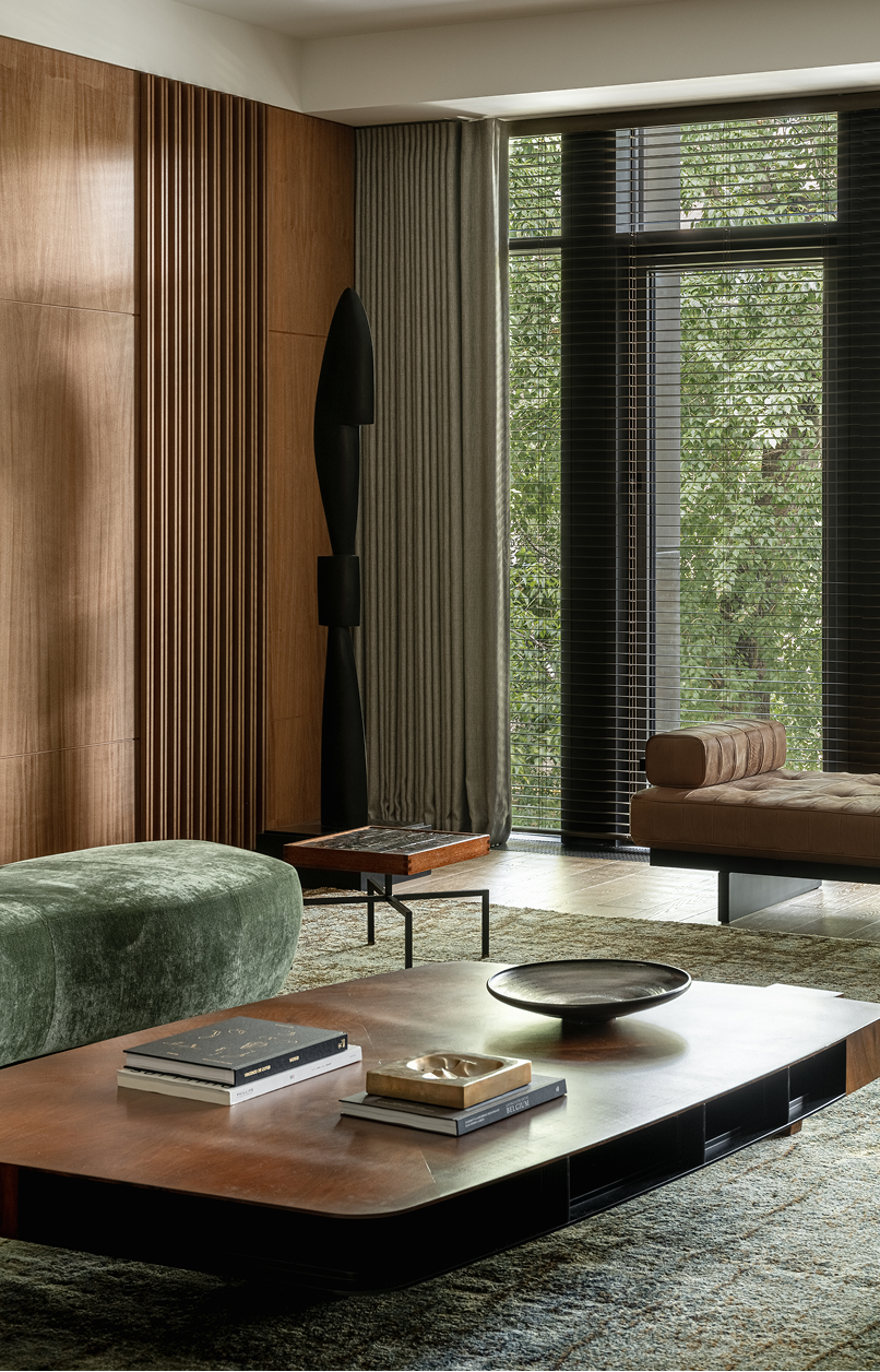 Black and white photo of teens rehearsing a dance routine on a stage.