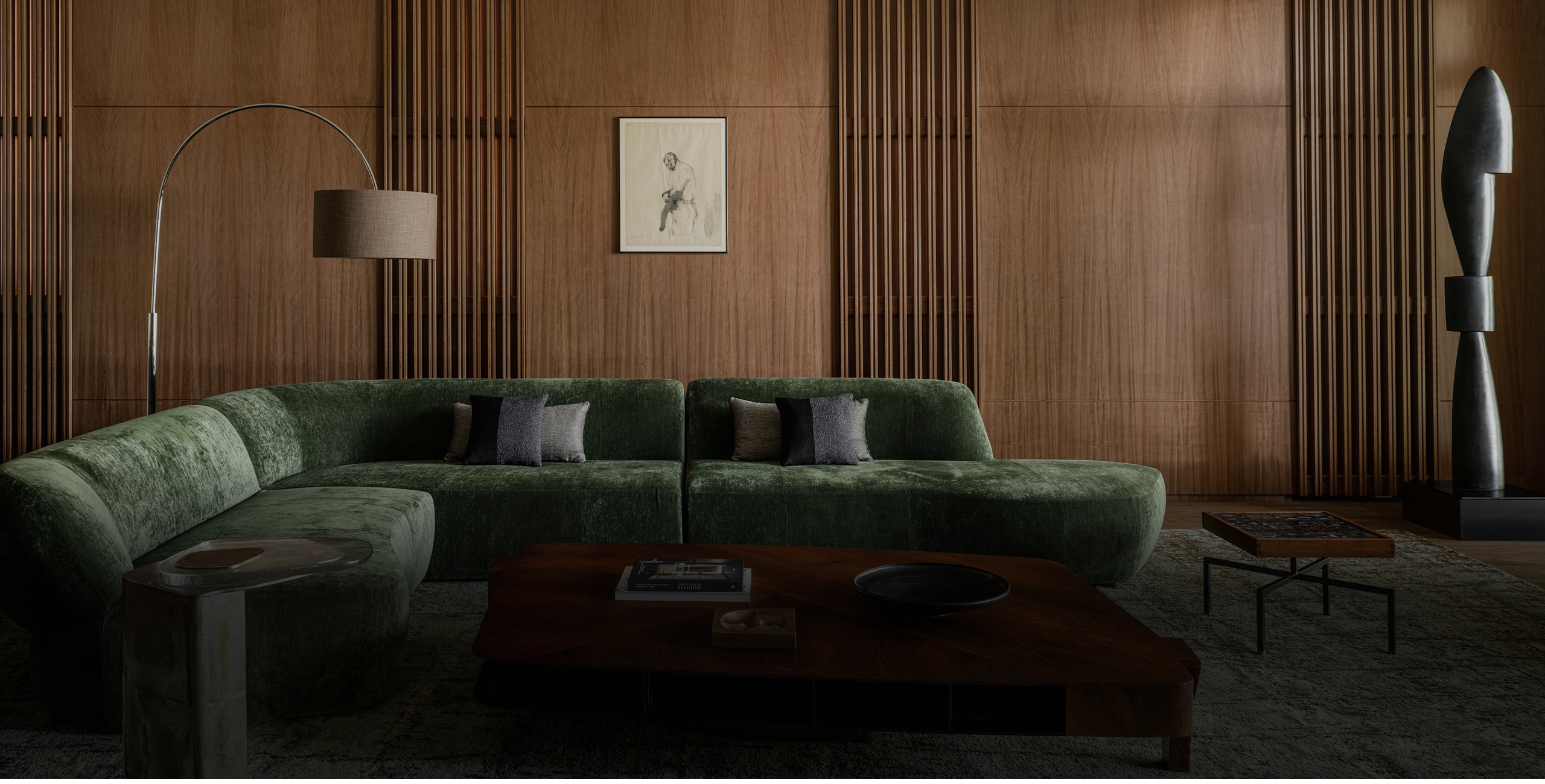 Black and white photo of teens rehearsing a dance routine on a stage.